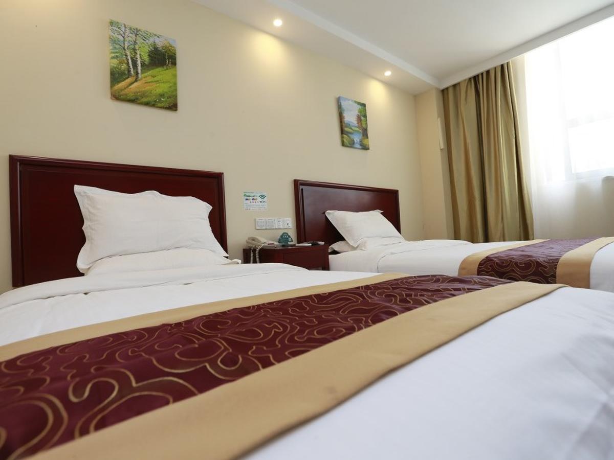 Greentree Inn Henan Qinyang Middle Huaifu Road Express Hotel Εξωτερικό φωτογραφία